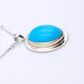 Turquoise bezel set necklace in silver and gold