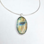 Large oval labradorite necklace bezel set in silver on round chain