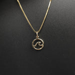 14k gold wave in circle necklace