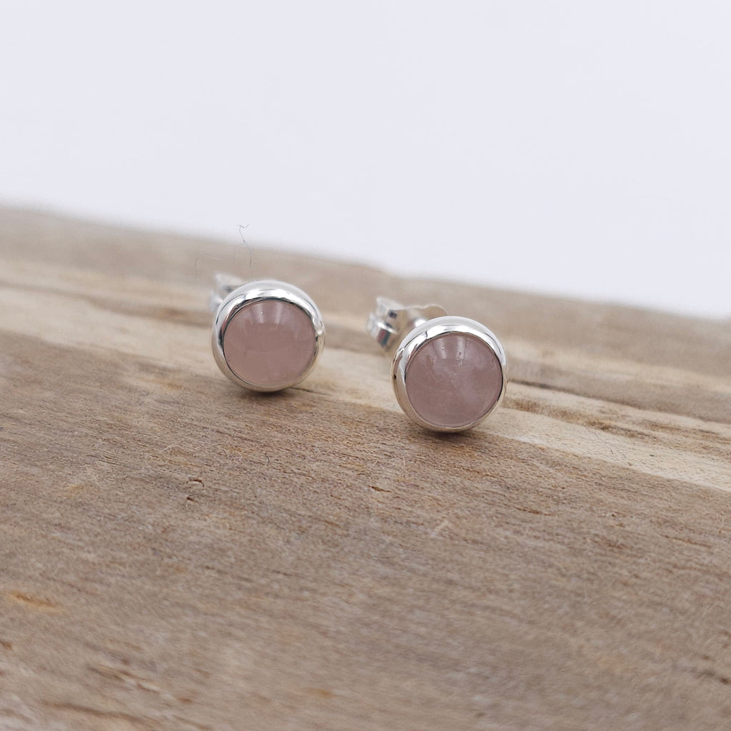 Rose quartz bezel set post earrings in sterling silver