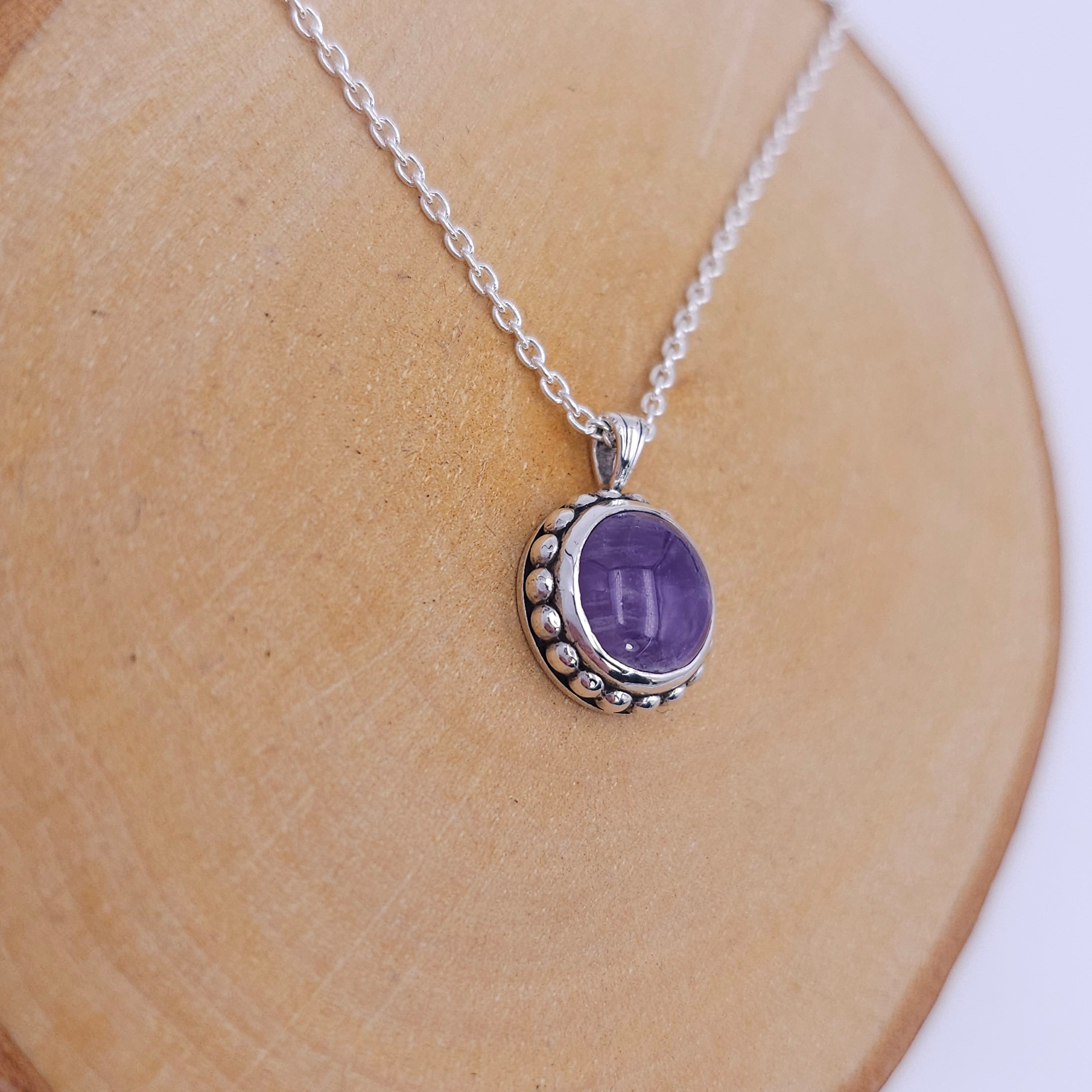 Amethyst and sterling silver bezel set necklace