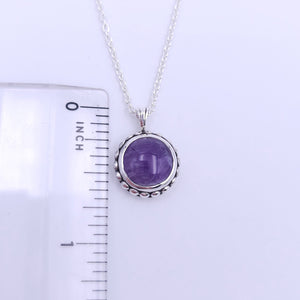 Amethyst and sterling silver bezel set necklace