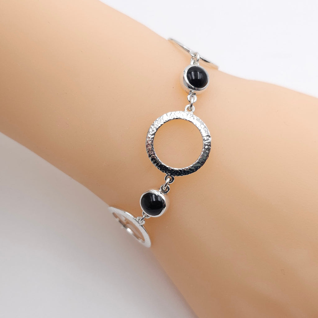 Sterling silver textured circles and black onyx link bracelet