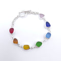 Bezel set rainbow colored sea glass silver link bracelet