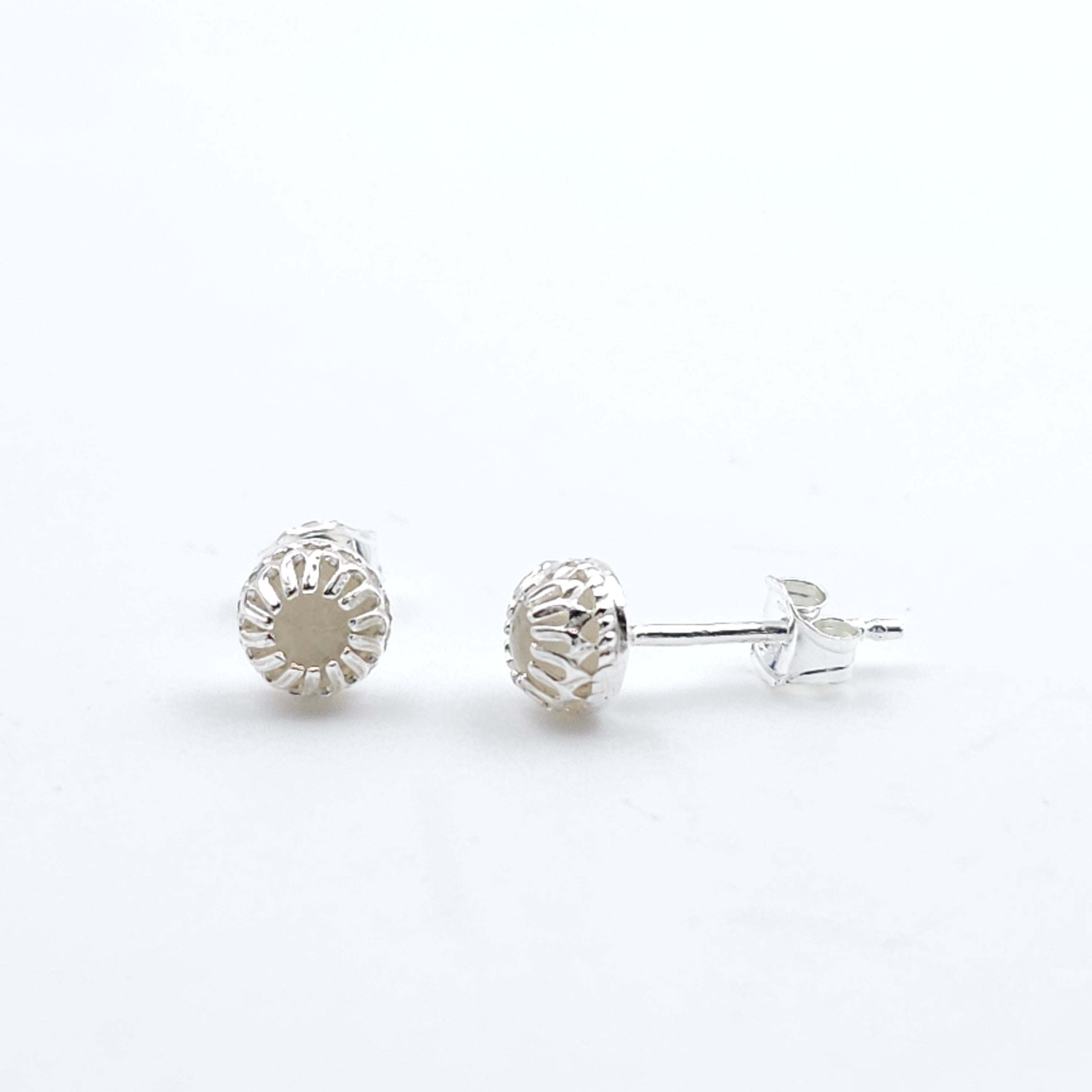 Moonstone post earrings in fancy sterling silver crown bezel setting