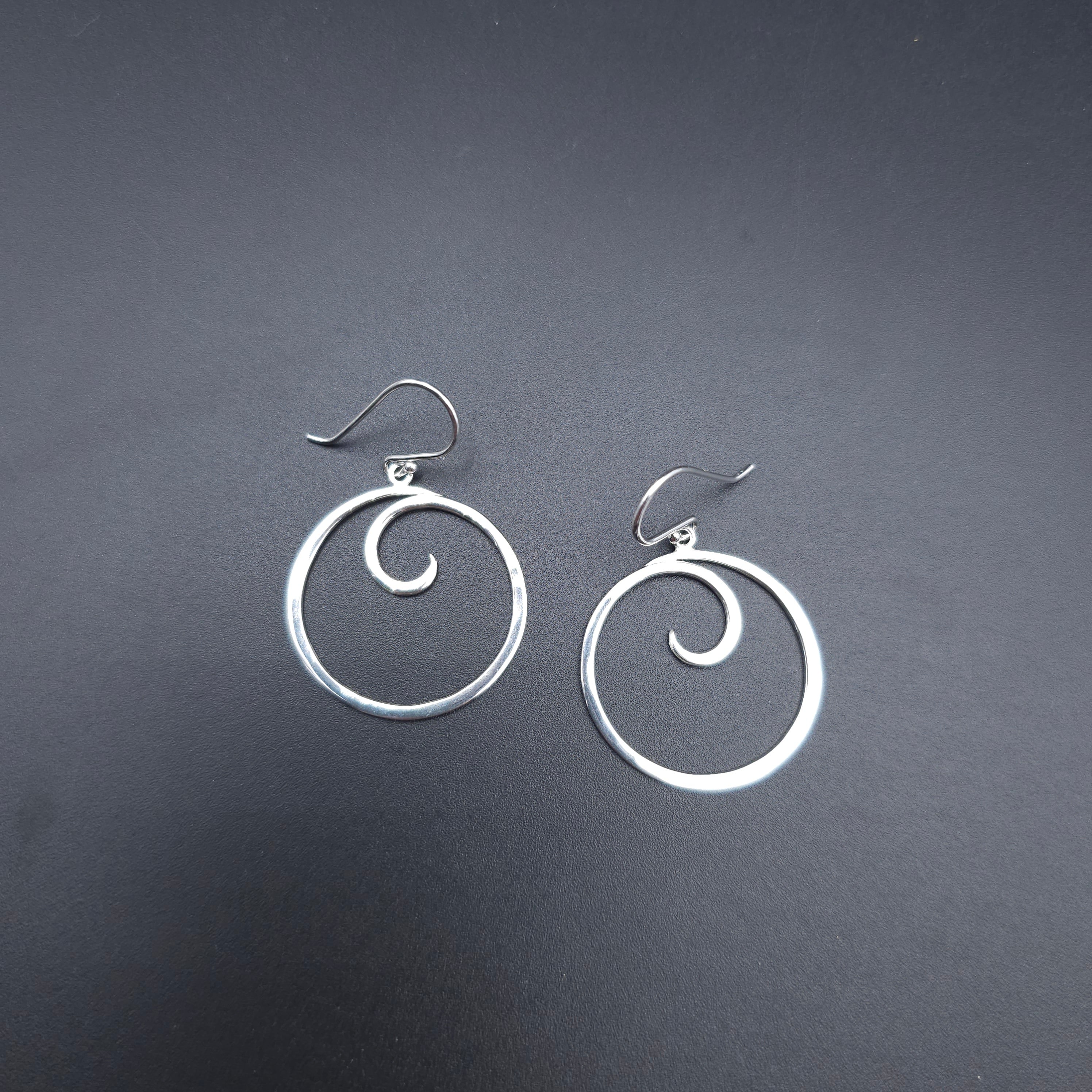 Sterling silver spiral dangle earrings