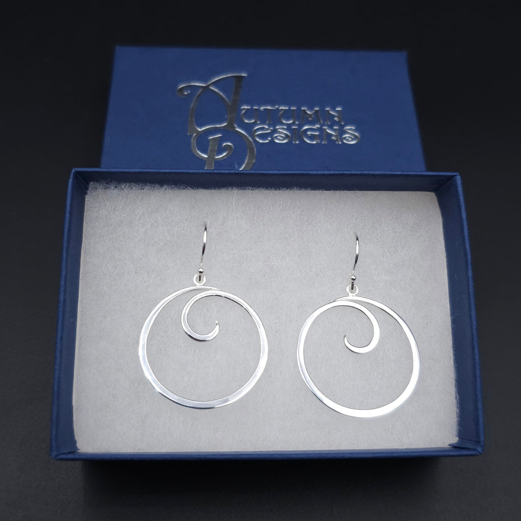 Sterling silver spiral dangle earrings