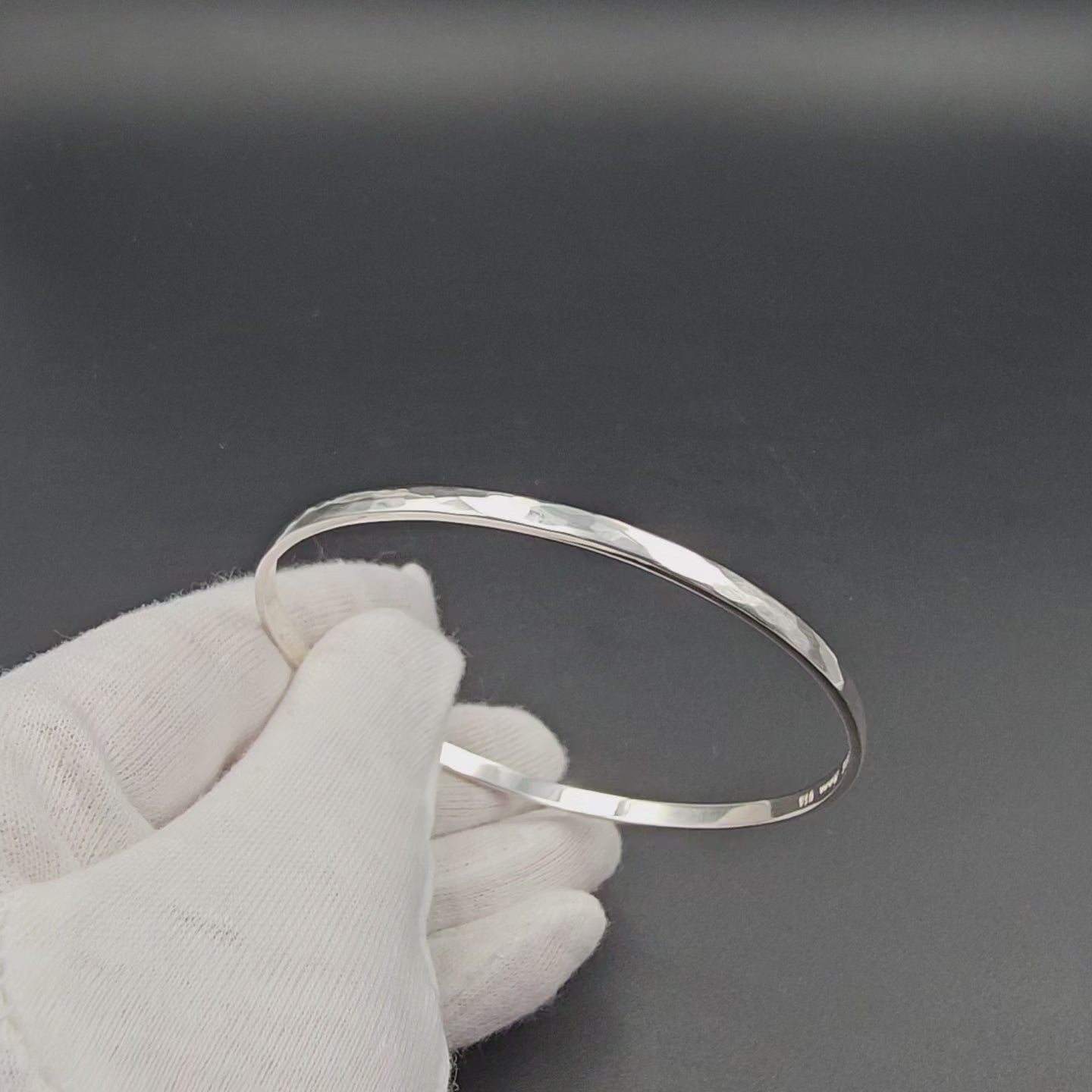 Slightly hammered sterling silver bangle bracelet