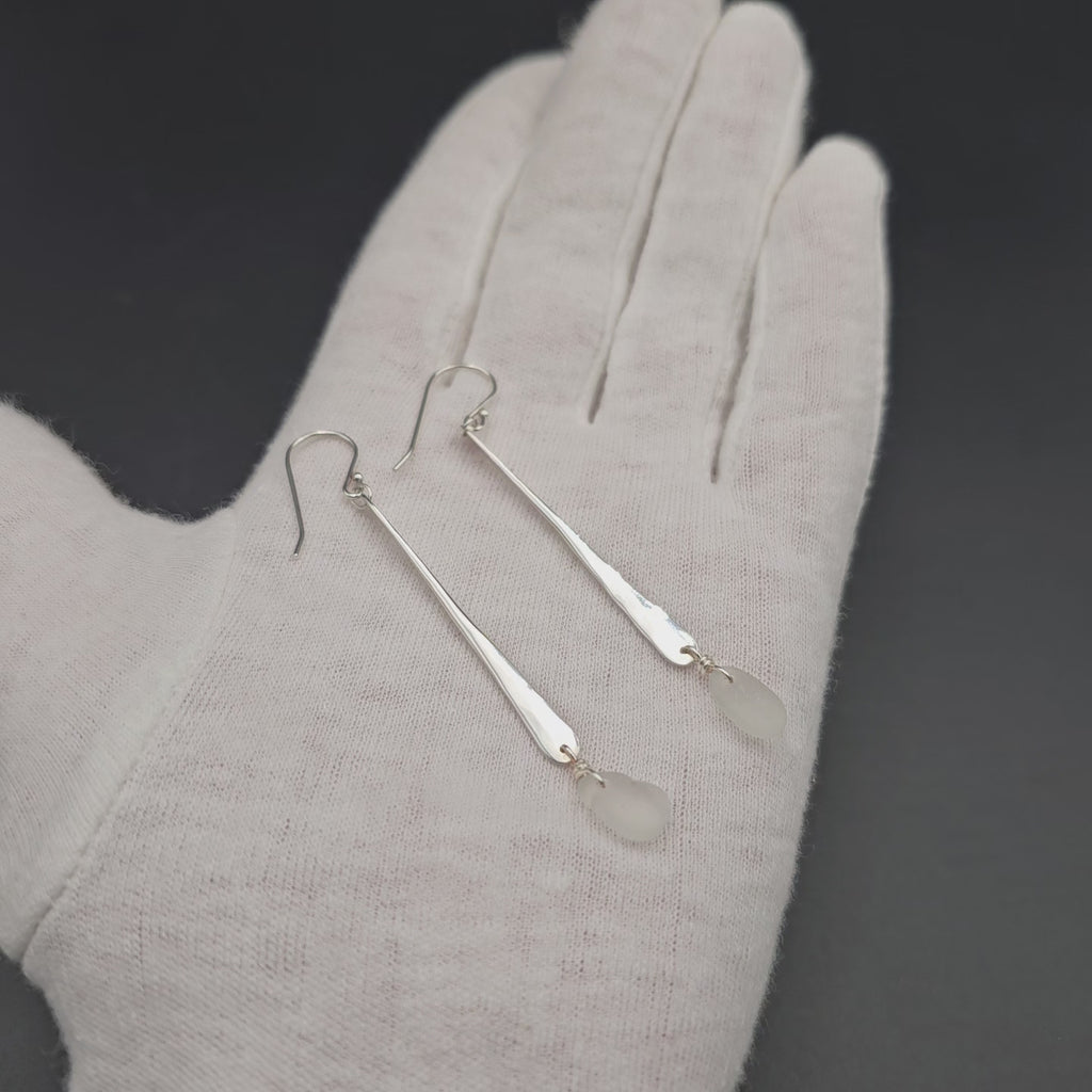 Long hammered dangle earrings with white sea glass