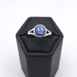 Sterling silver ring with bezel set round blue kyanite gemstone
