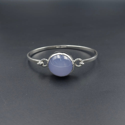 Silver hook on bracelet with light purple oval bezel set Chalcedony gemstone in center