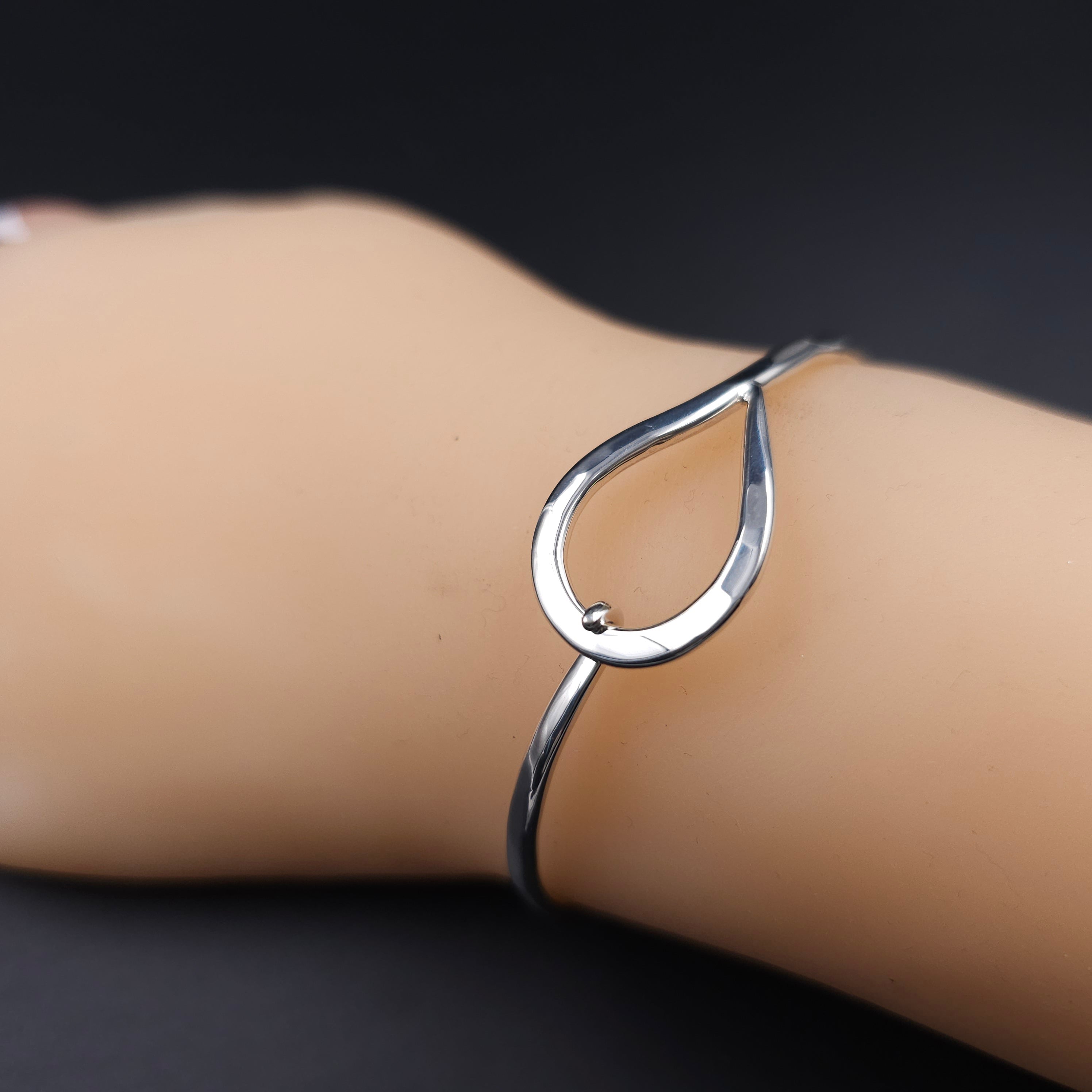 Sterling silver teardrop hook on bracelet