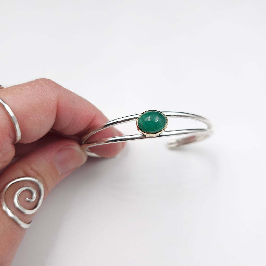 Sterling silver emerald cuff bracelet with 18k gold bezel
