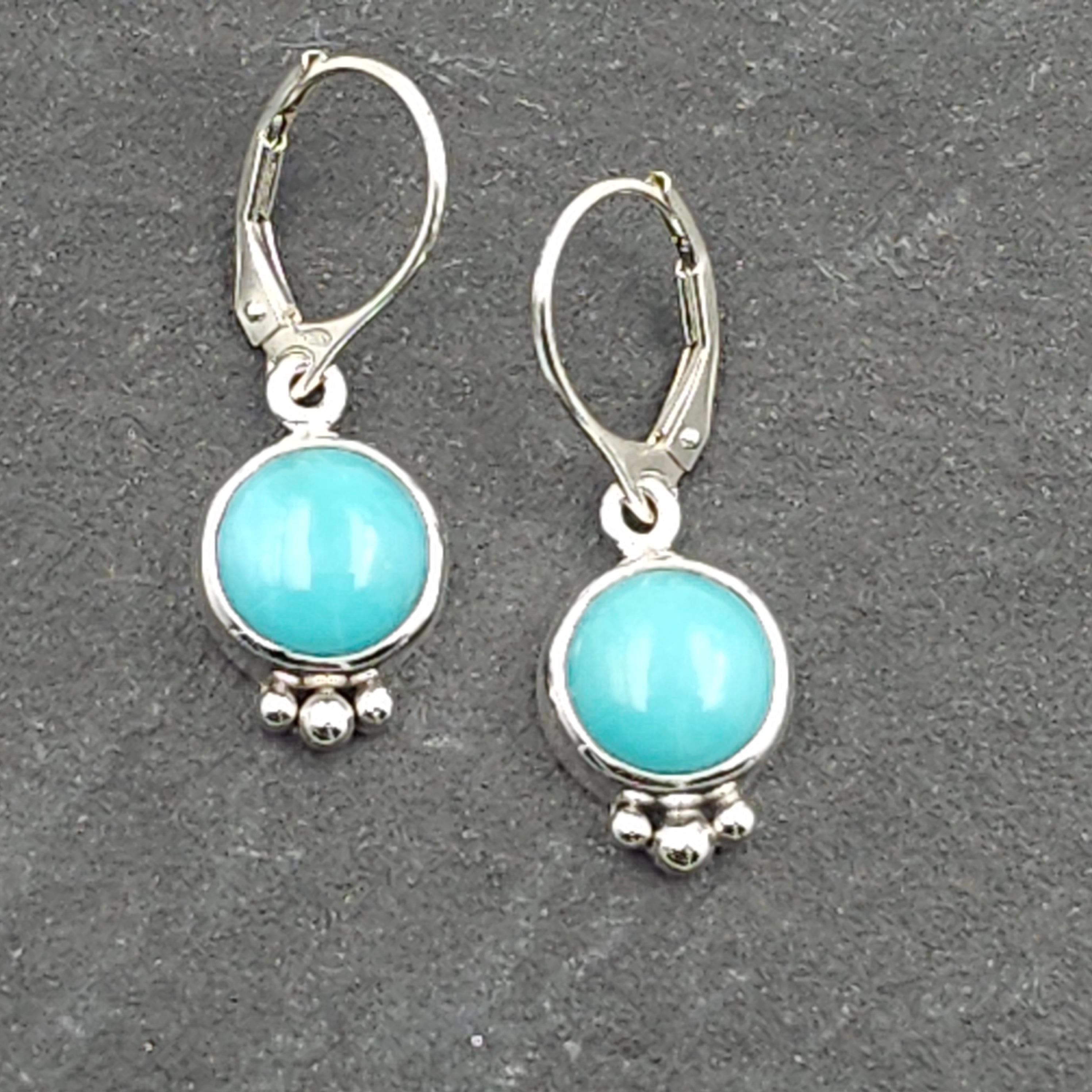 Round turquoise and sterling silver dangle earrings with silver beaded accents