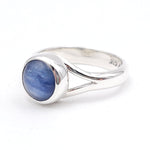 Sterling silver ring with bezel set round blue kyanite gemstone