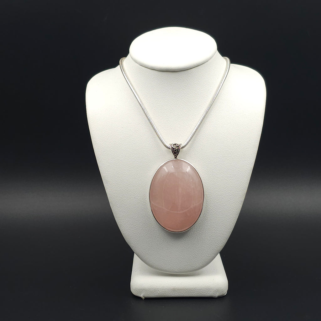 Large oval rose quartz bezel set sterling silver necklace