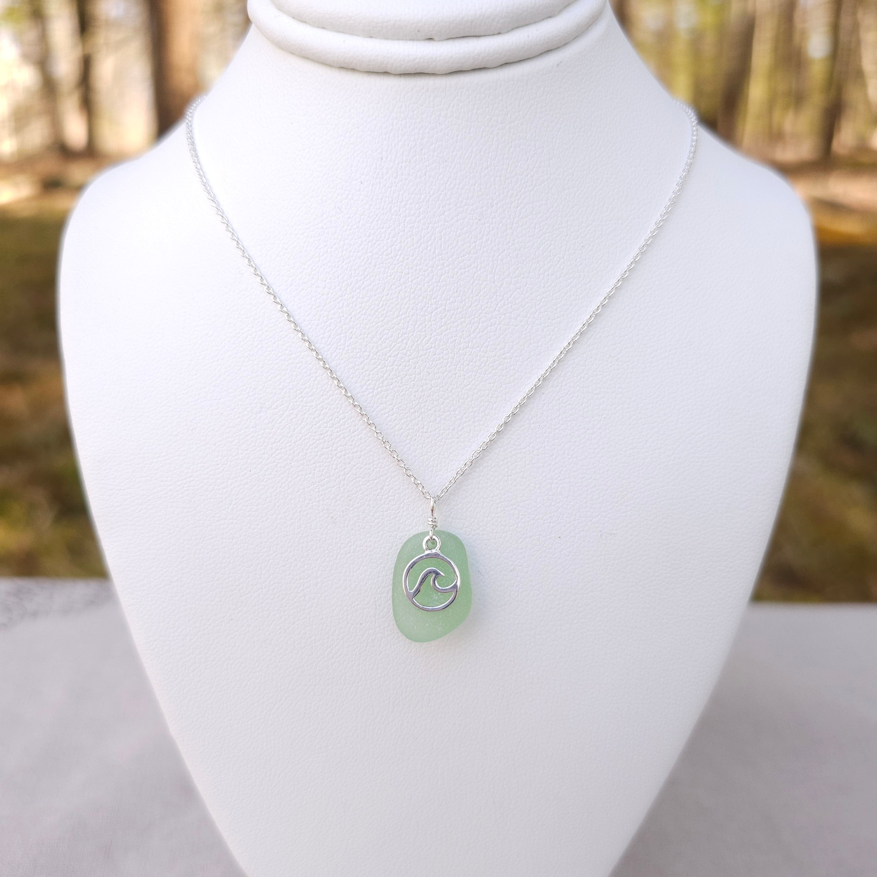 Green sea glass necklace with wave in circle charm