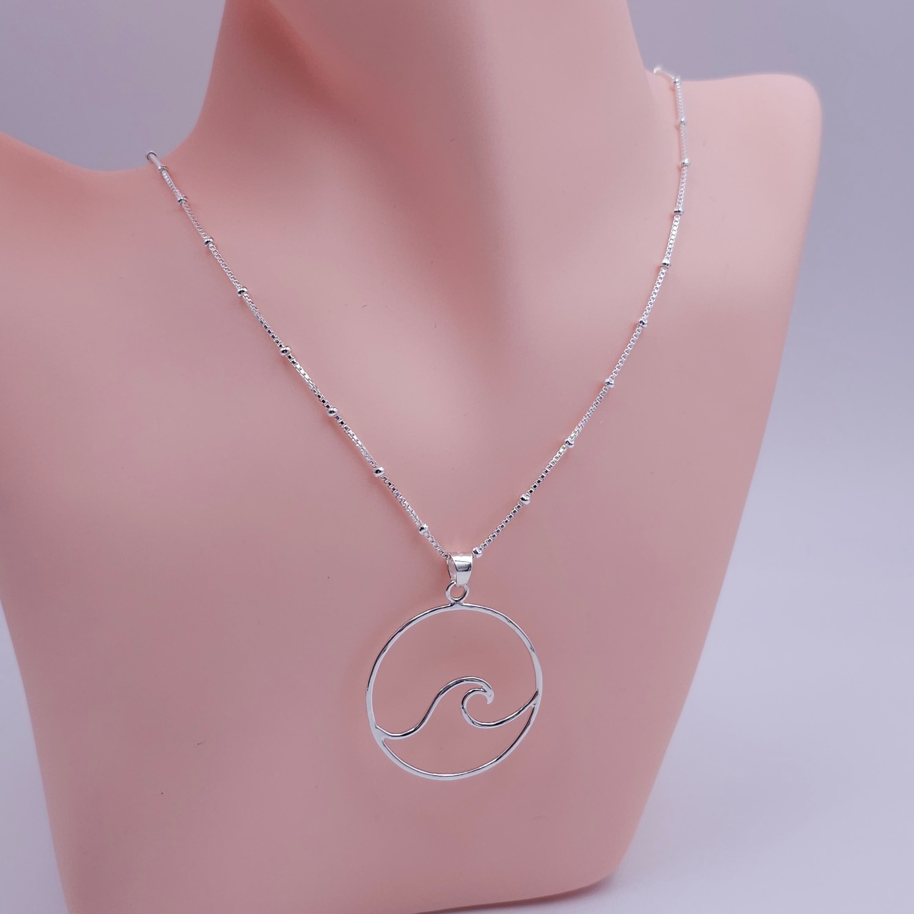 Large wave in circle necklace