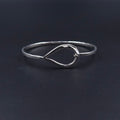 Silver teardrop hook on bracelet