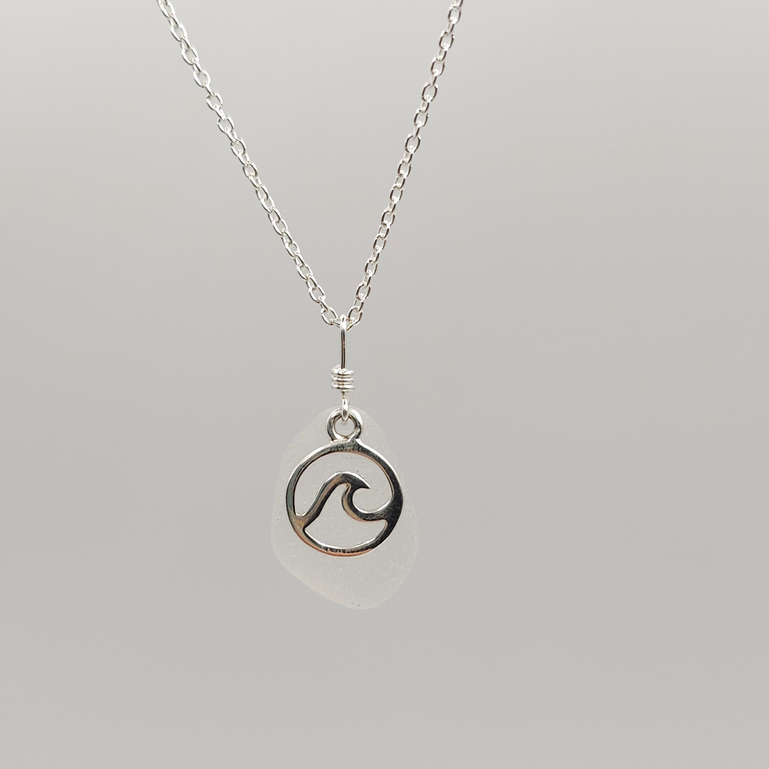 White sea glass necklace with wave in circle