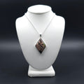 Diamond shaped bezel set sterling silver necklace