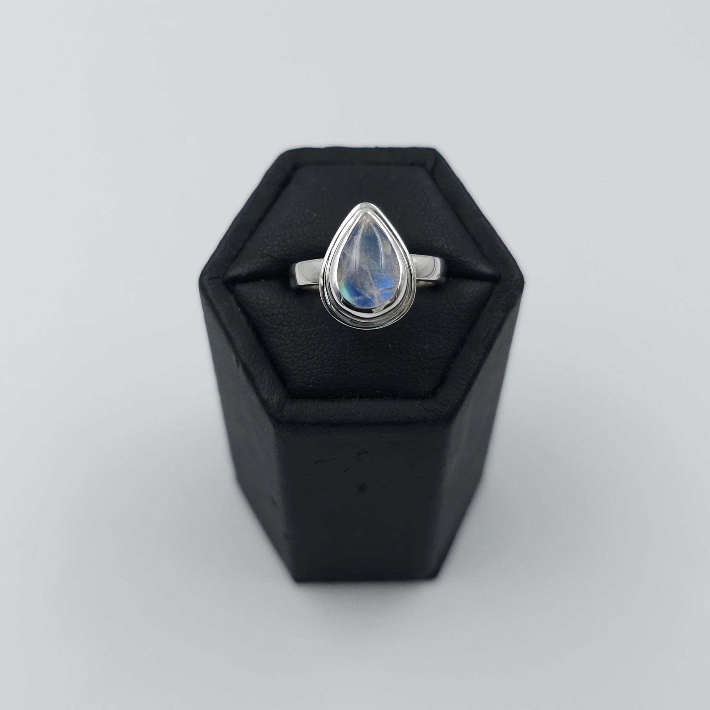 Rainbow moonstone teardrop bezel set sterling silver ring