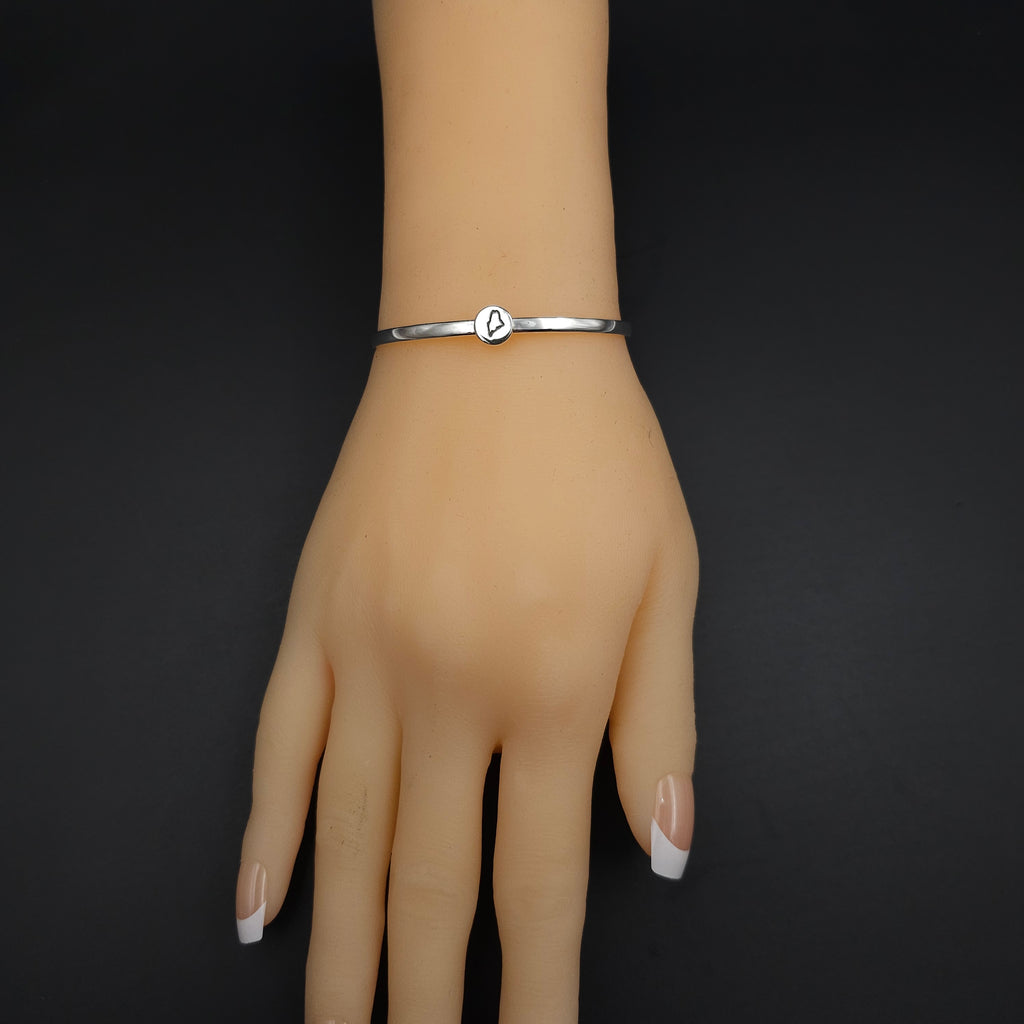 Maine cuff bracelet shown on wrist