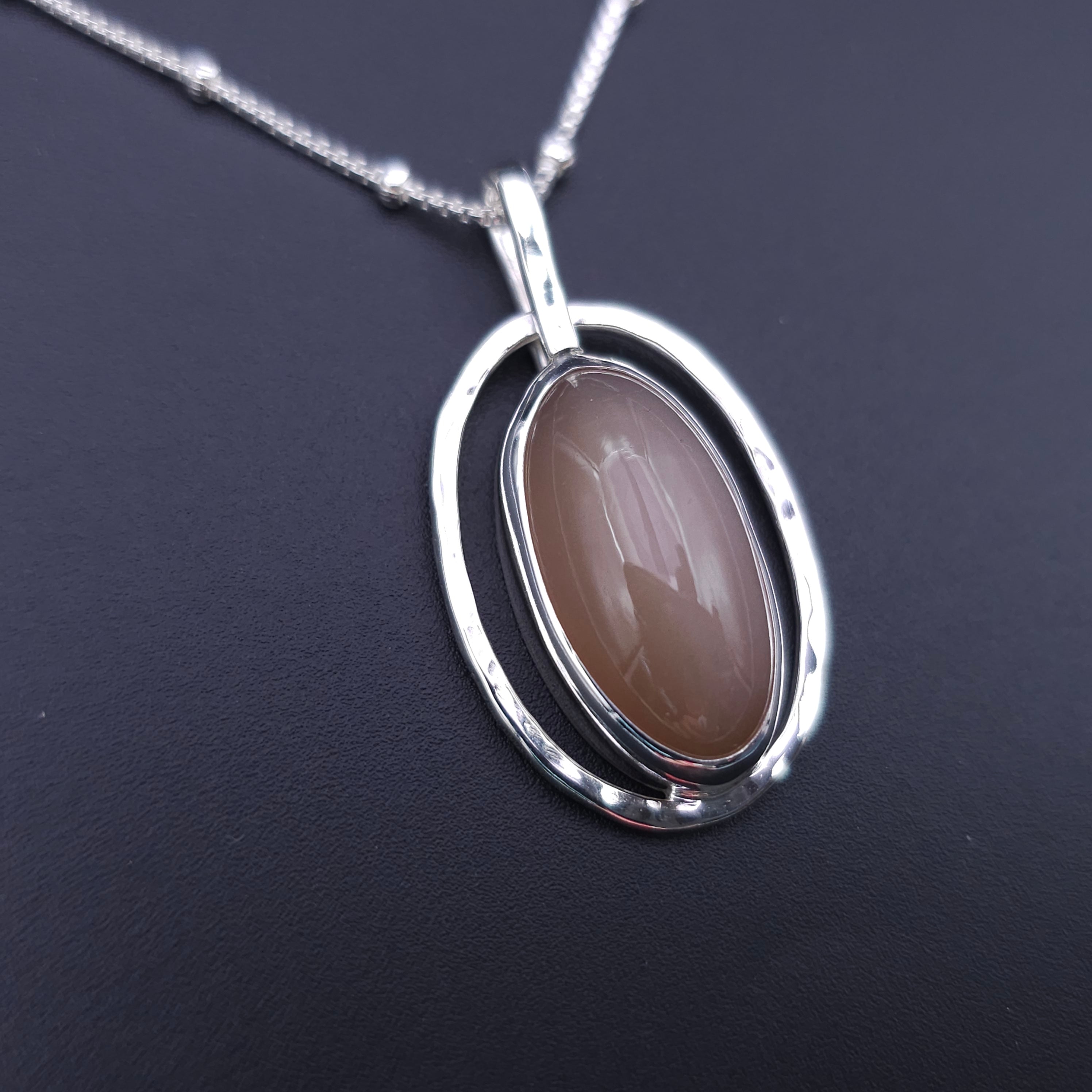Oval peach moonstone sterling silver necklace