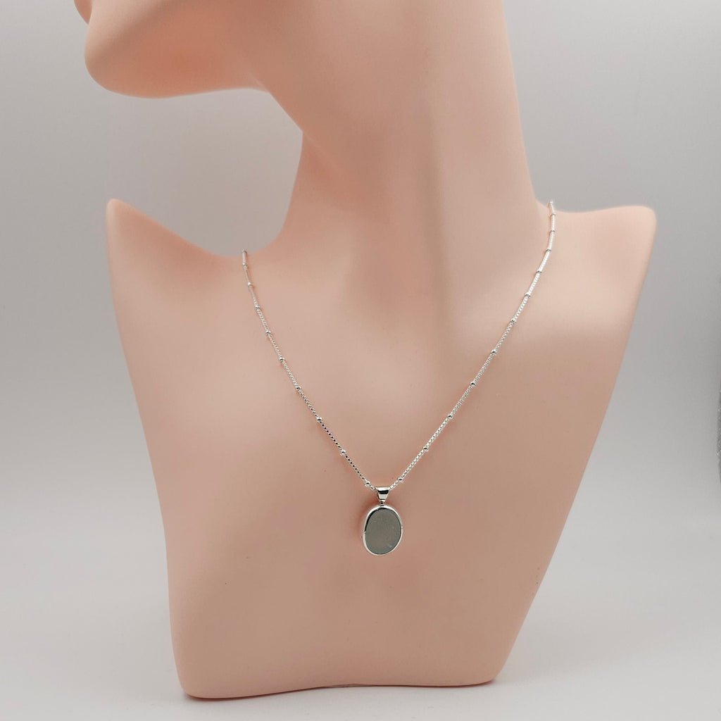 Genuine aqua sea glass sterling silver bezel set necklace