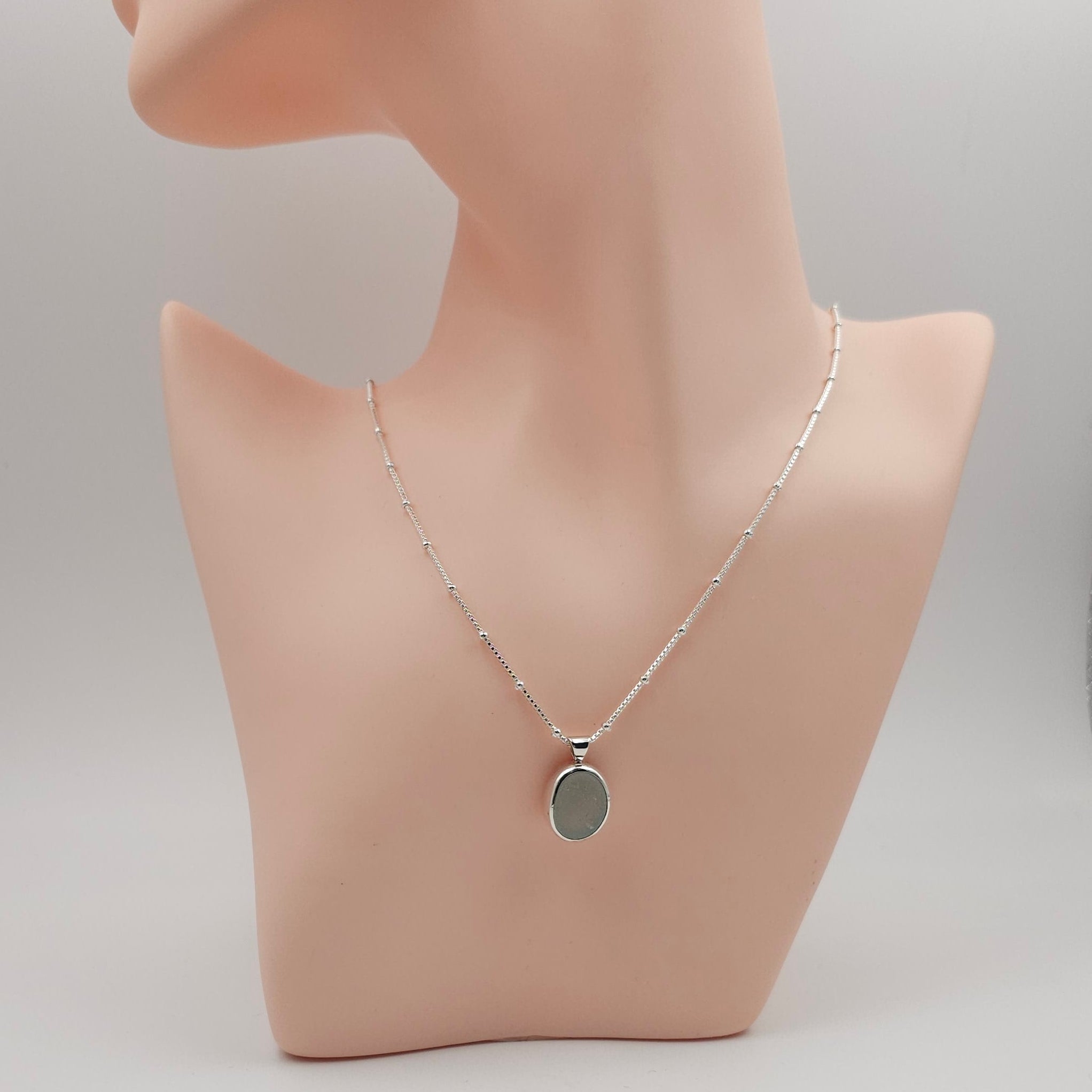 Genuine aqua sea glass sterling silver bezel set necklace