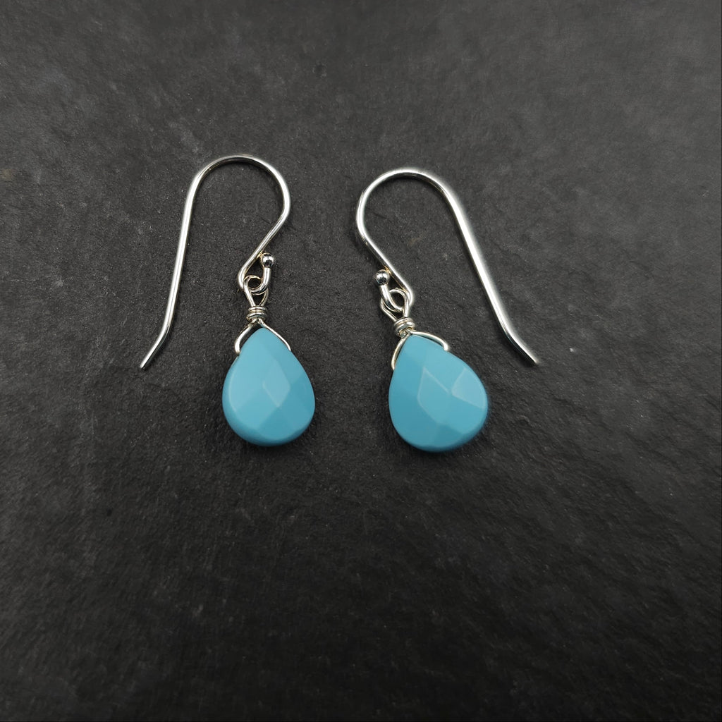 Light blue faceted teardrop earrings with silver french earring wires