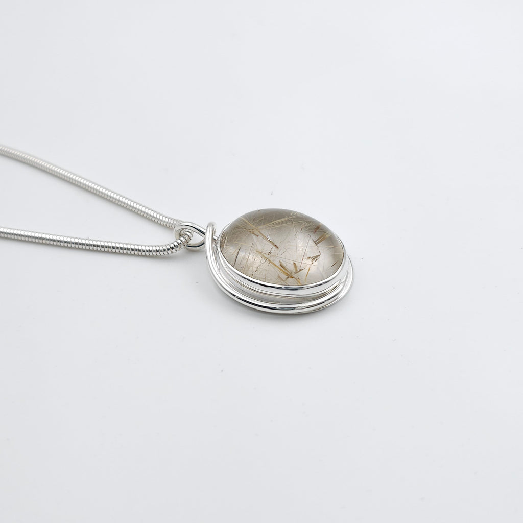 Rutilated quartz bezel set sterling silver necklace