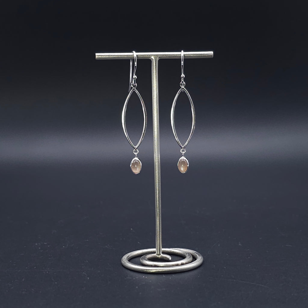 Sterling silver marquise shaped earrings with peach moonstone dangles