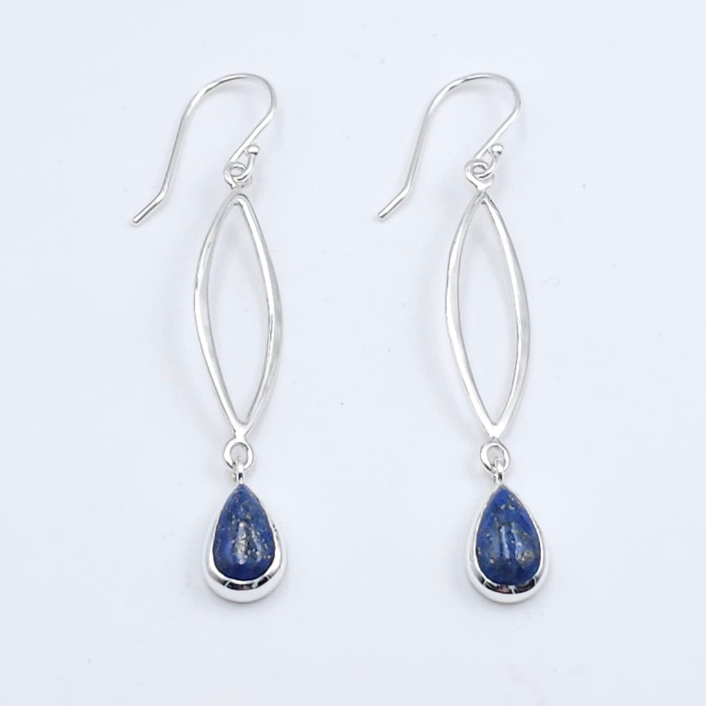 Silver wire in marquis shape dangles below french earring wires, with bezel set lapis stones dangling below marquis.