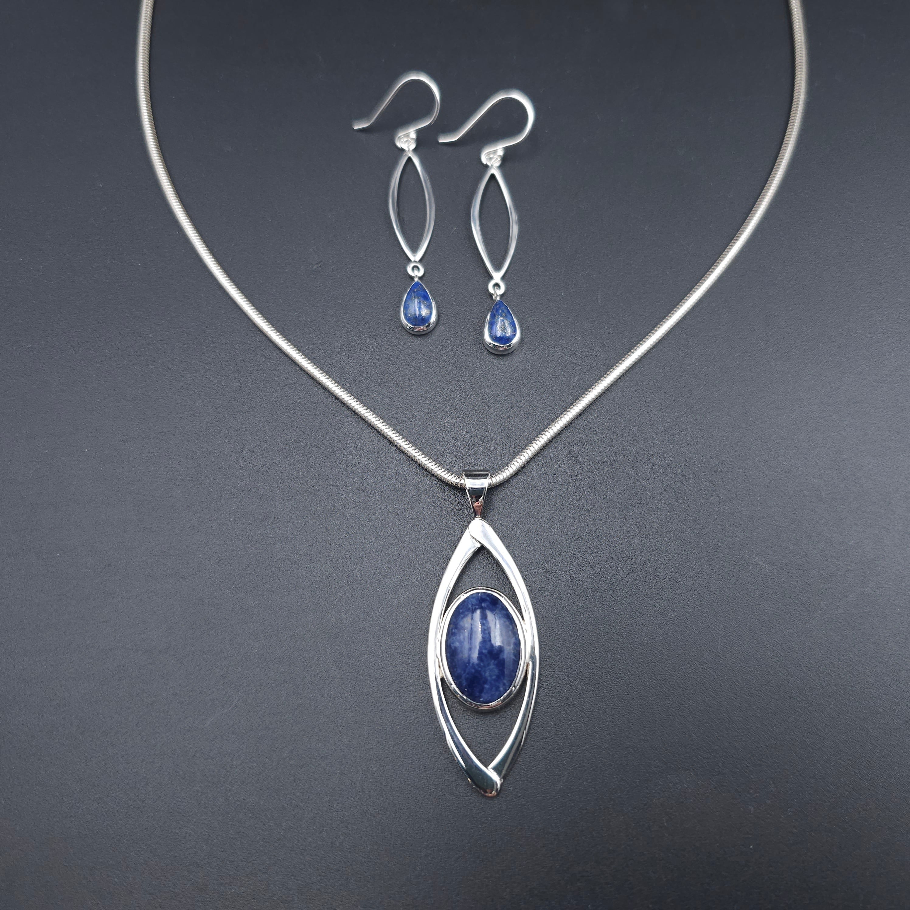 Sterling silver marquis shaped earrings with teardrop lapis dangles