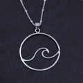 Open wire design with wave shape inside circle border. Silver bail attached to jump ring at top to provide movement.