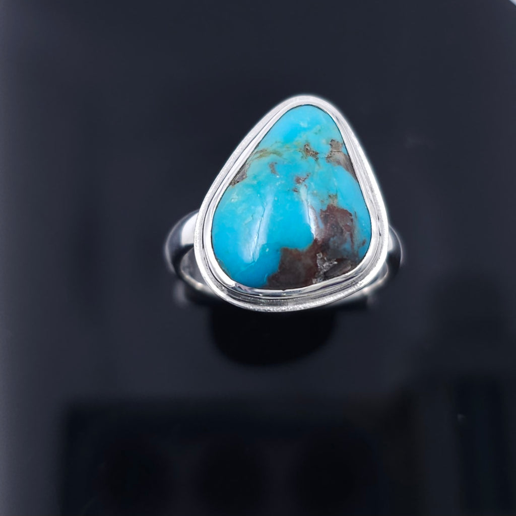 Turquoise ring in sterling silver bezel setting 