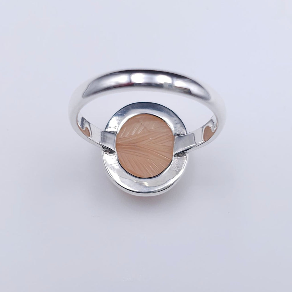 Carved peach moonstone sterling silver ring