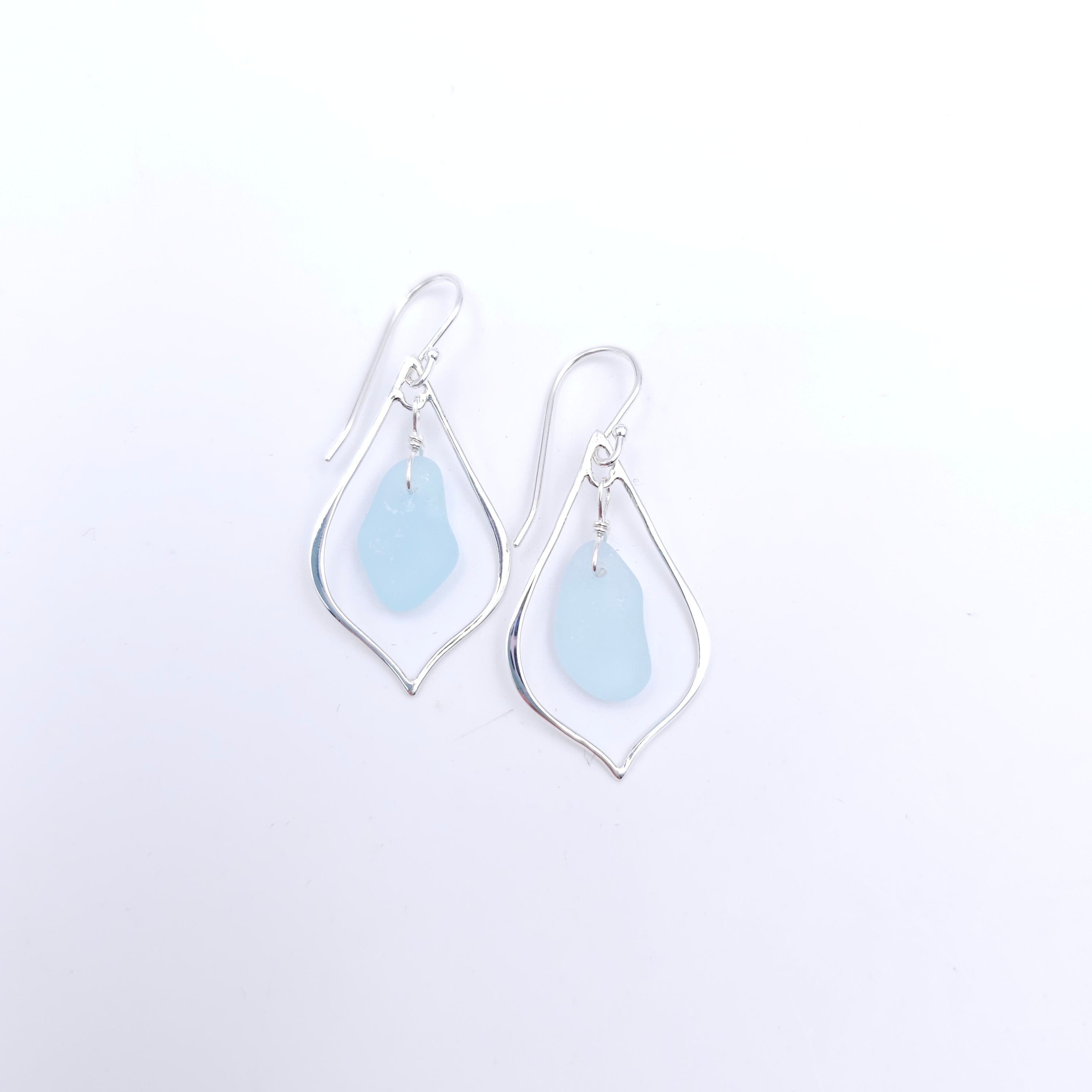 Sterling silver pointed teardrop earrings with light blue sea glass