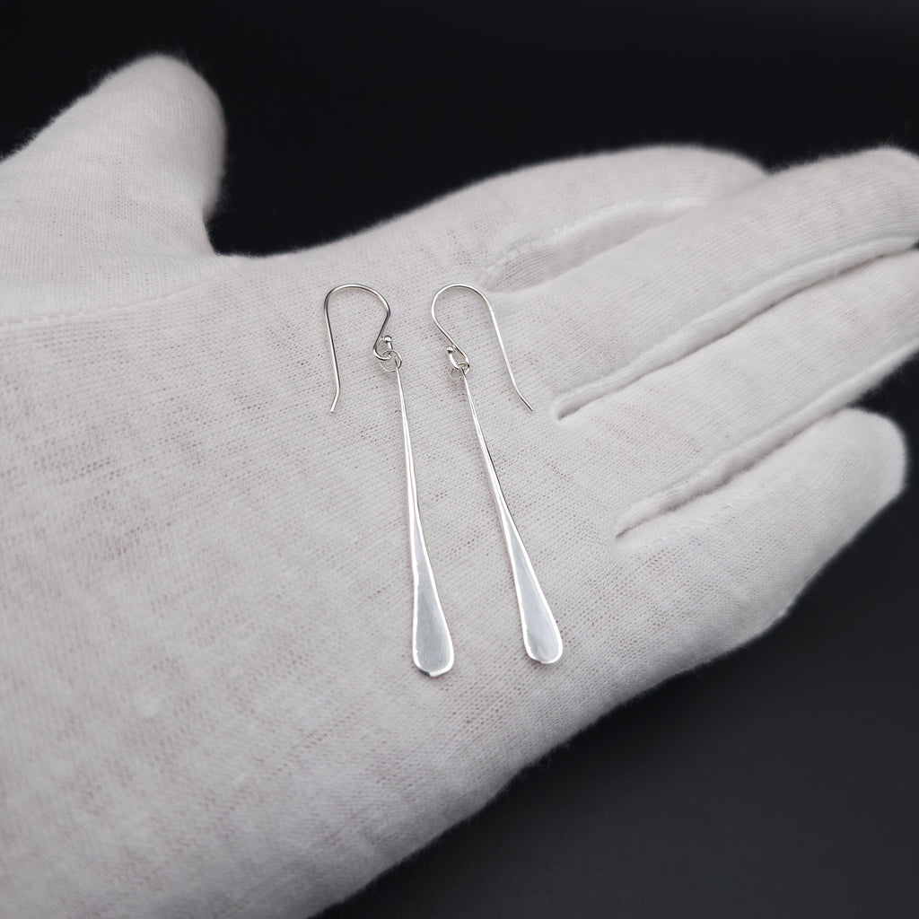 Long hammered sterling silver earrings