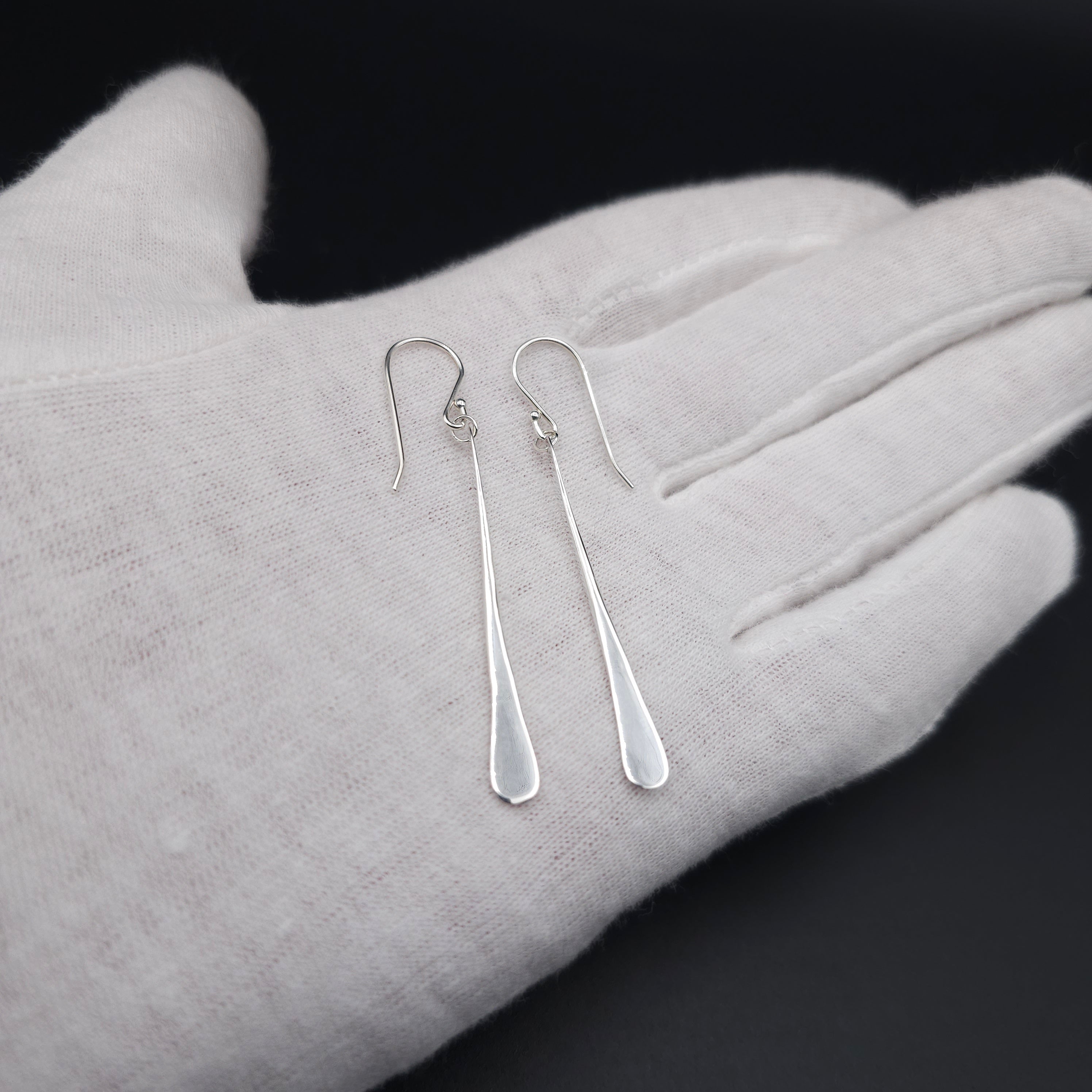 Long hammered sterling silver earrings
