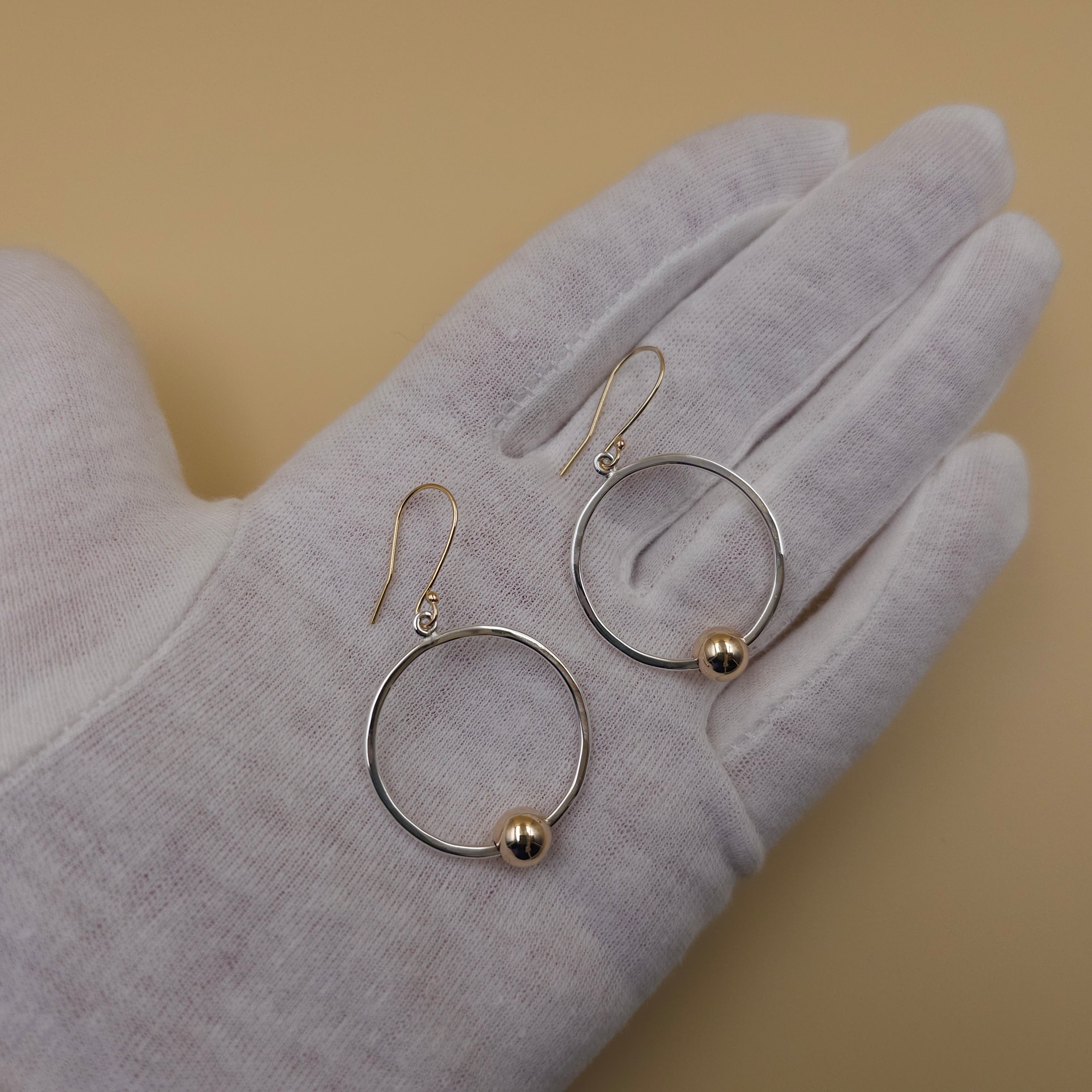 Two-tone sterling silver and gold-filled dangle circle earrings