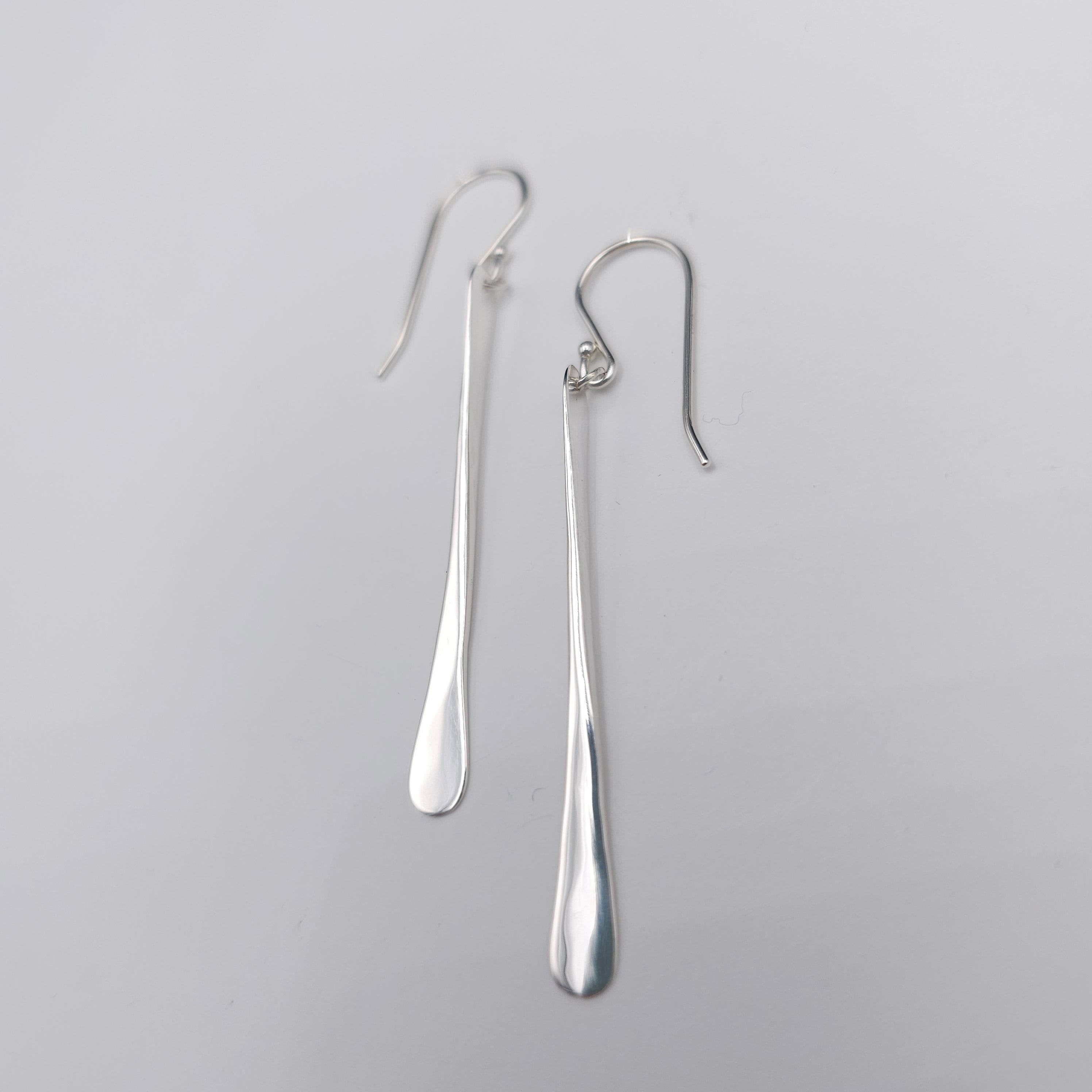 Long hammered sterling silver earrings