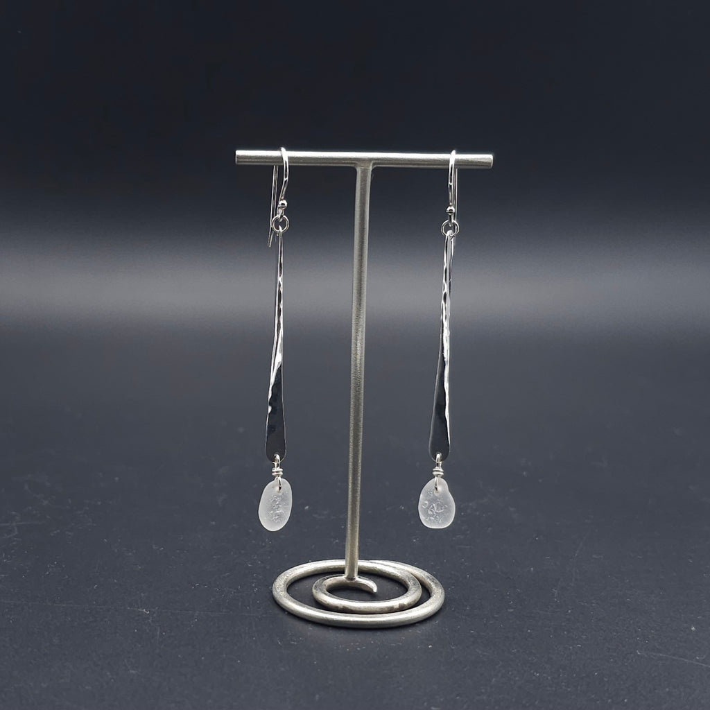 Long hammered dangle earrings with white sea glass