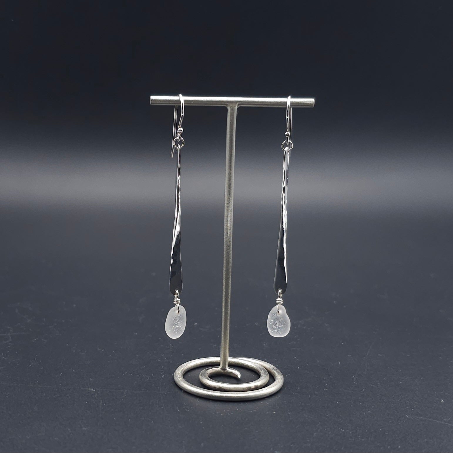 Long hammered dangle earrings with white sea glass