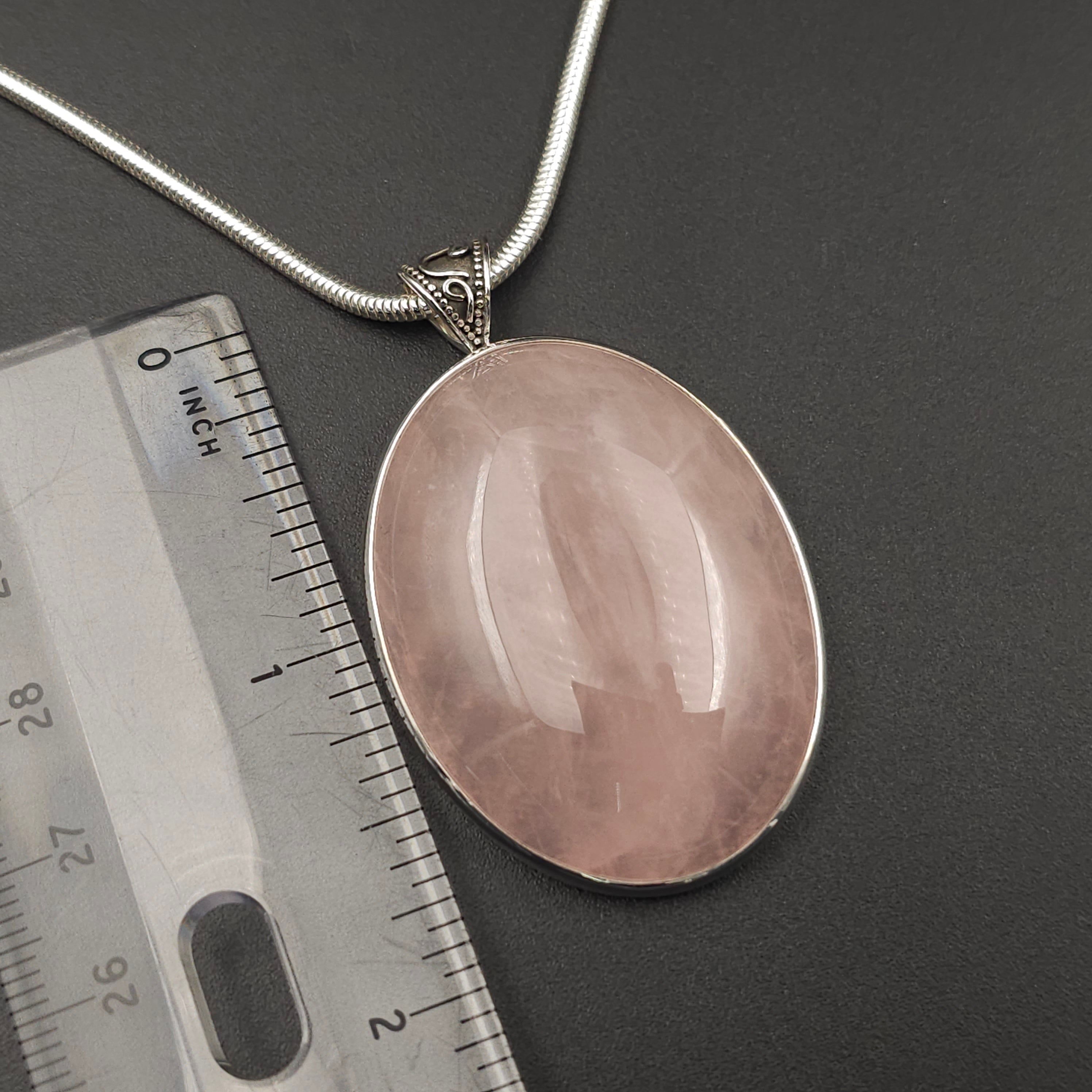 Large oval rose quartz bezel set sterling silver necklace