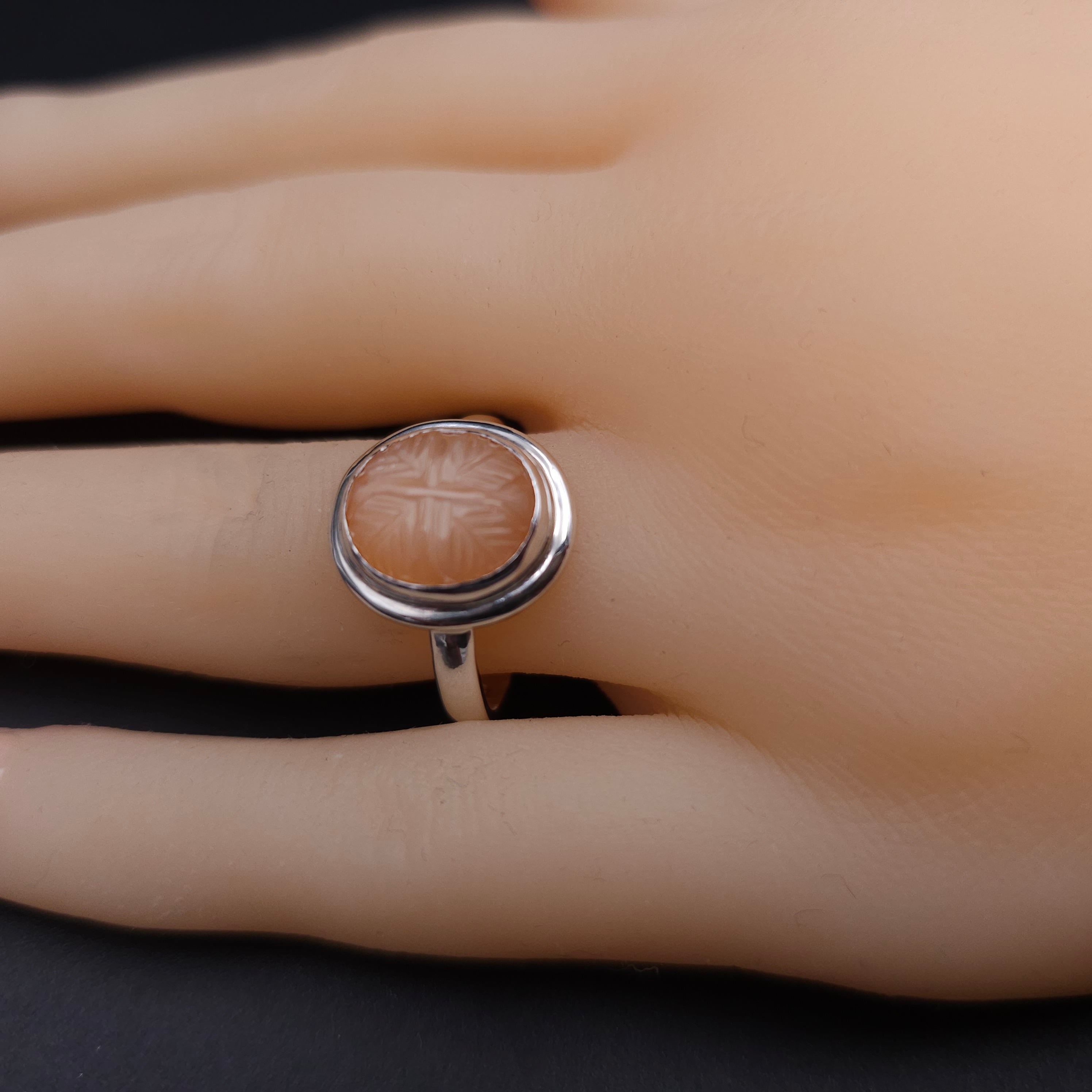 Carved peach moonstone sterling silver ring