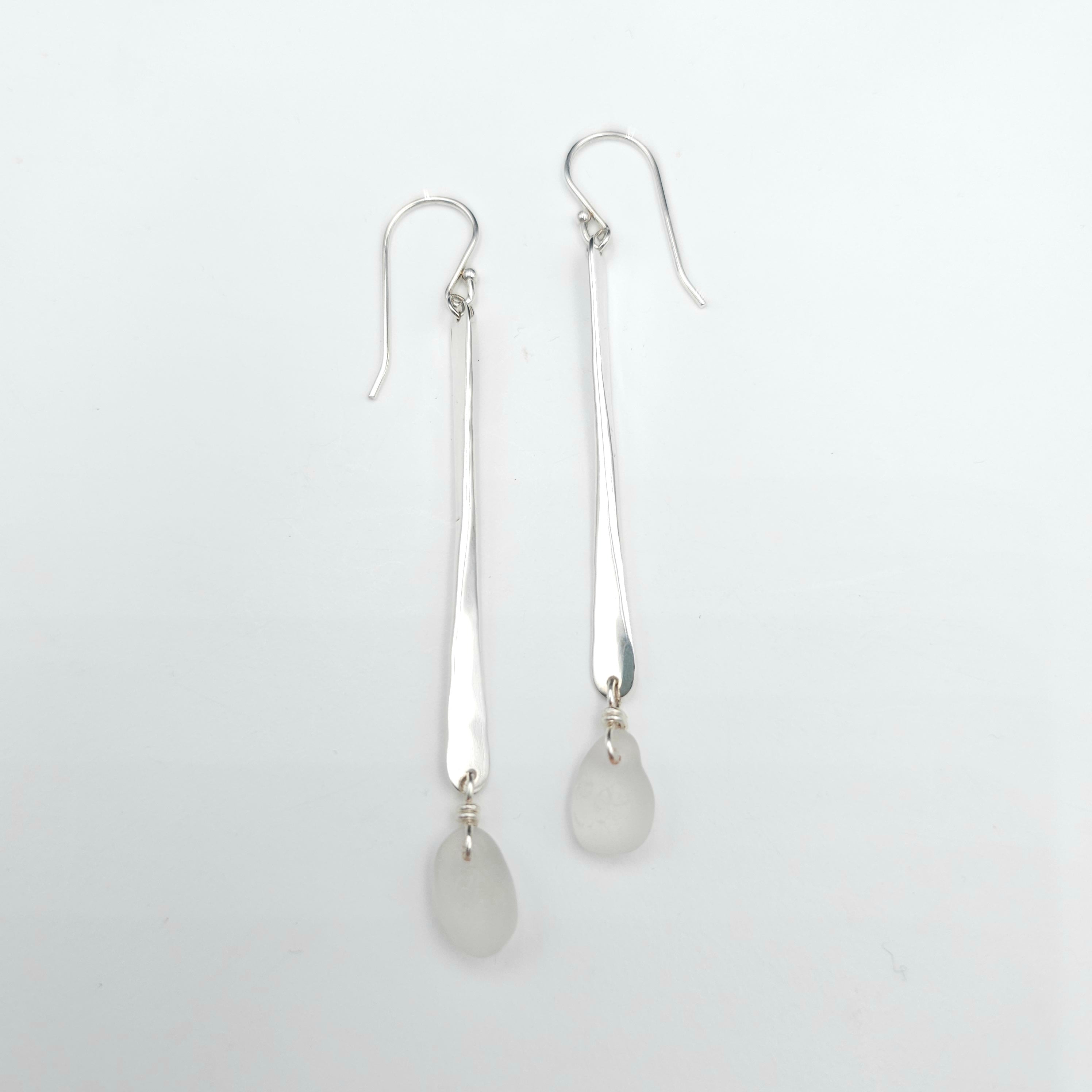 Long hammered dangle earrings with white sea glass