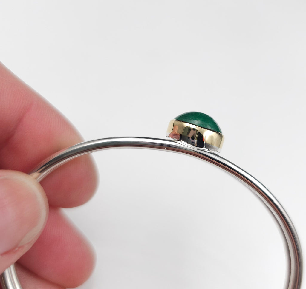 Sterling silver emerald cuff bracelet with 18k gold bezel