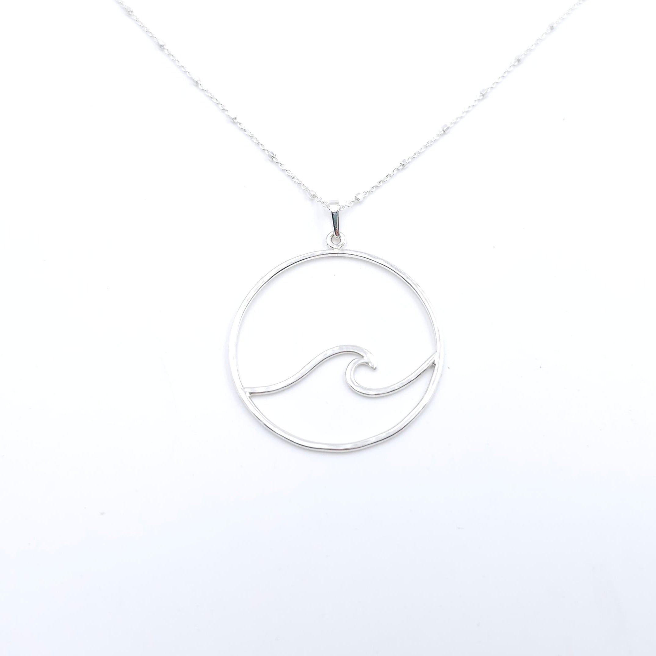 Large wave in circle necklace